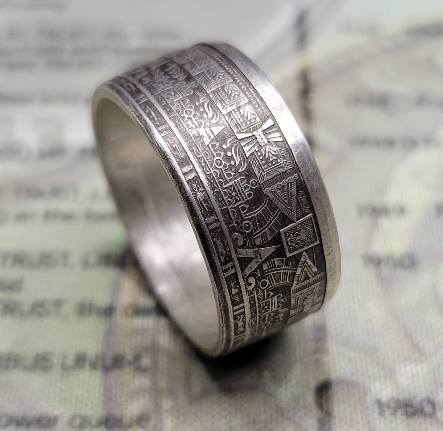 Large Aztec calendar coin ring