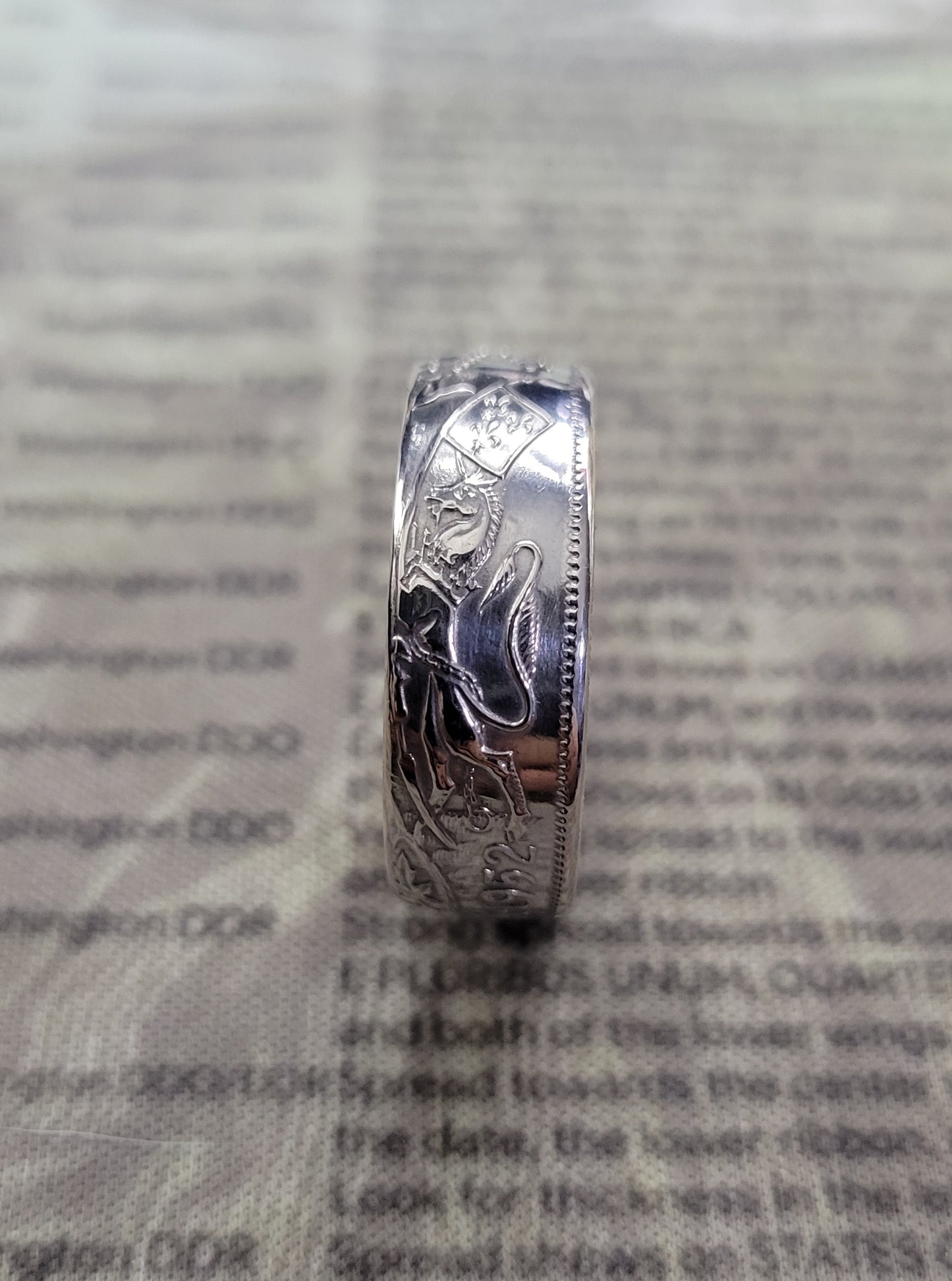 Canadian 50 cent reverse side out coin ring